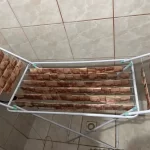 Polícia encontra cédulas secando em varal durante operação contra lavagem de dinheiro em SC