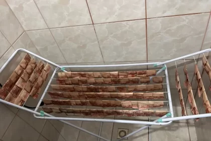 Polícia encontra cédulas secando em varal durante operação contra lavagem de dinheiro em SC